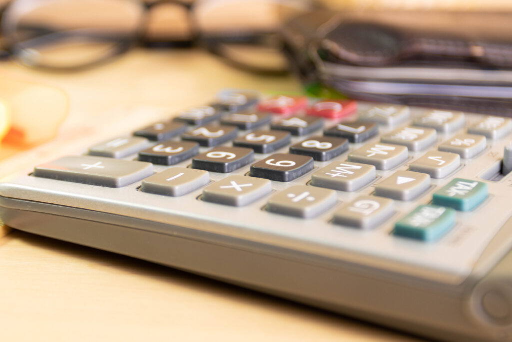 Closeup image of a calculator for calculating child support in family law.